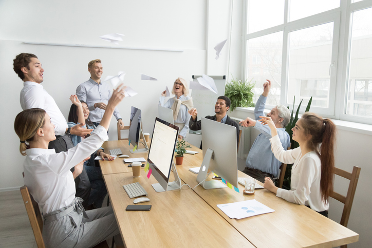 Enjoying their victory together is one way on how to keep employees happy in the workplace.